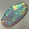 SOLID SEMI BLACK OPAL Bright sparkles, red, orange, green